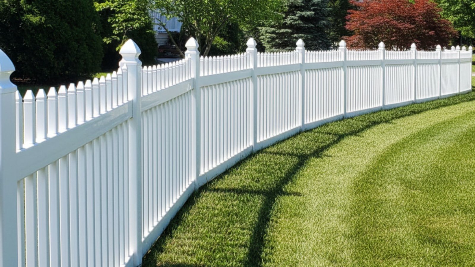 White vinyl privacy fence installed by a professional fencing contractor in Connecticut